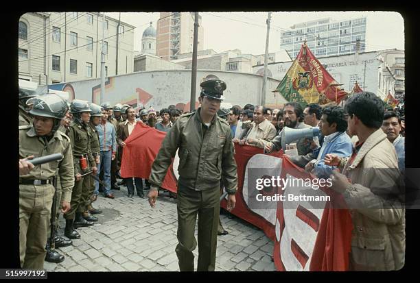 La Paz, Bolivia: Riot police try to block an anti-government protest staged by the workers of Bolivia and the peasants about recent economic measures...