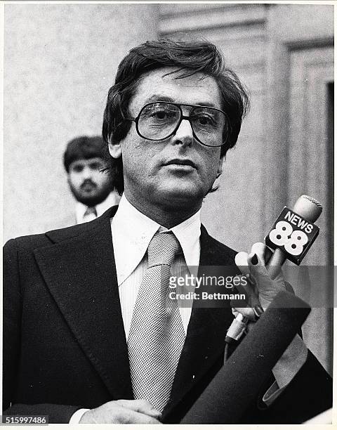 New York, NY-: Millionaire movie producer Robert Evans talks to reporters 10/7 after he pleaded guilty to a charge of possessing cocaine. Evans was...