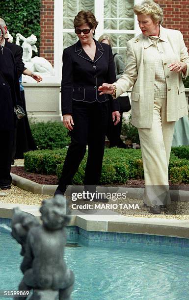 First Lady Laura Bush tours Hillwood Museum and Gardens, the former estate of philanthropist Marjorie Merriweather Post, 09 April 2001 in Washington,...