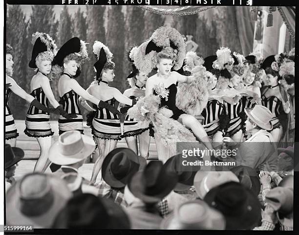 Hollywood, CA.: LADIES OF THE CHORUS. Angela Lansbury, who portrays em, a dance hall queen, in MGM'S musical "The Harvey Girls," puts her all into...