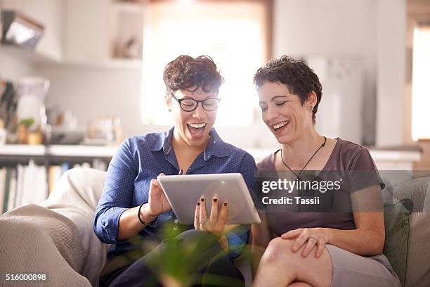 technology gives them more ways to share the love - lady 30s wearing glasses stock pictures, royalty-free photos & images