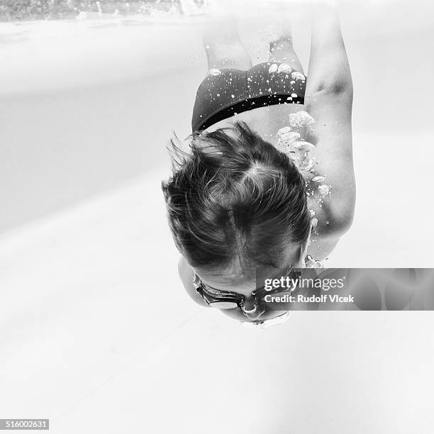 diving kid (boy) - high key stock-fotos und bilder