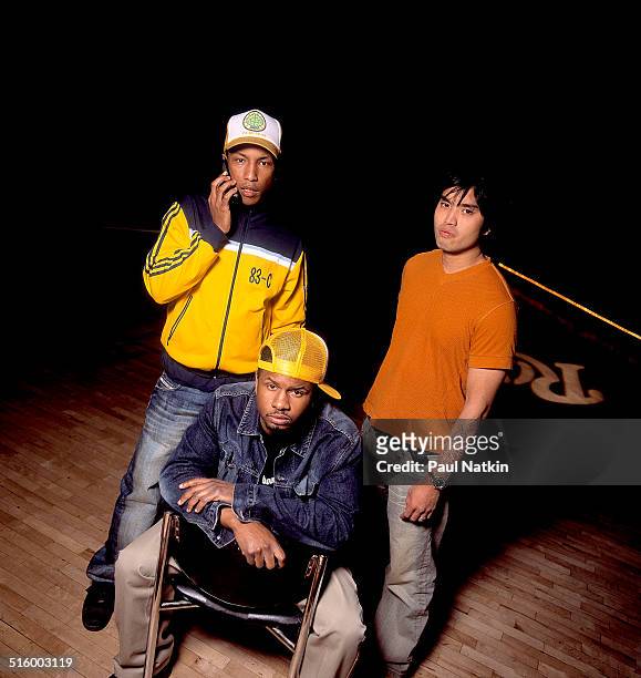 Portrait of American band NERD, Chicago, Illinois, August 30, 2002. Pictured are, from left, Pharrell Williams, Shay Haley, and Chad Hugo.