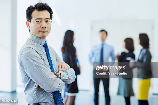 business team working in office - man explaining studio stock pictures, royalty-free photos & images