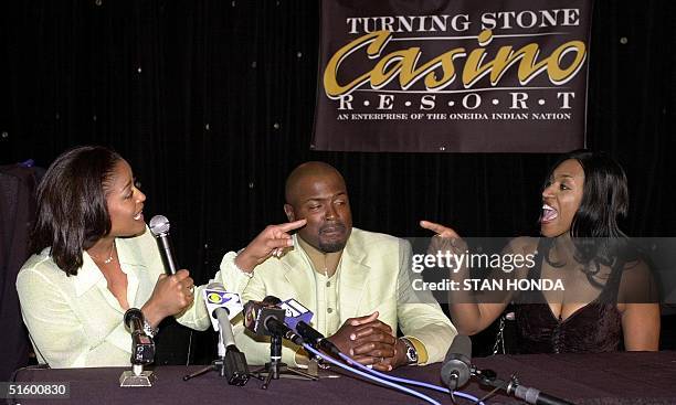 Laila Ali of Los Angeles and Jacqui Frazier of Philadelphia trade barbs during a press conference 27 April in New York. The two were promoting their...