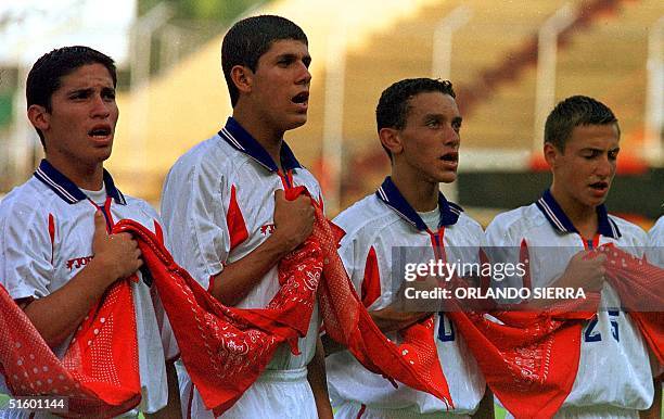 Costa Rica players Cristian Bolanos, Pablo Jimenez, Armando Rodriguez and Roger Estrada from the sub-17 team sing 02 May 2001 their National anthem...