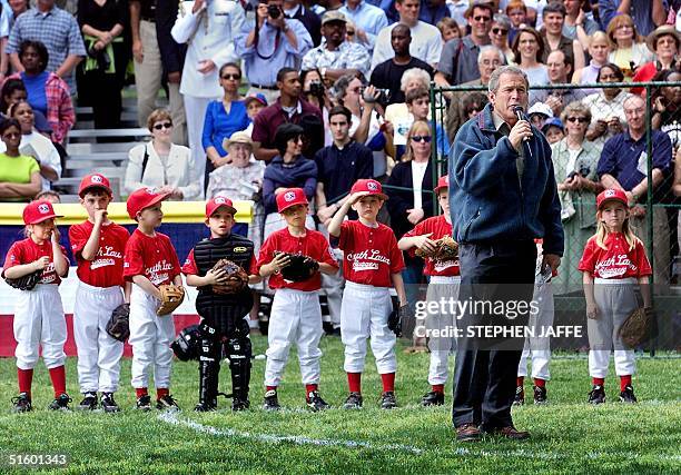 President George W. Bush addresses ball players in the first T-ball game on the South Lawn of the White House, 06 May 2001, in Washington, DC. Bush...