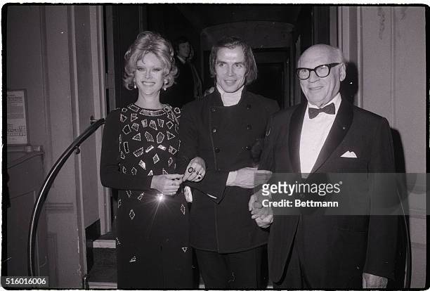 January 27, 1971-After The Dance---New York: International dancer Rudolph Nureyev escorts actress Monique Van Vooran and impresario Sol Hurok into...