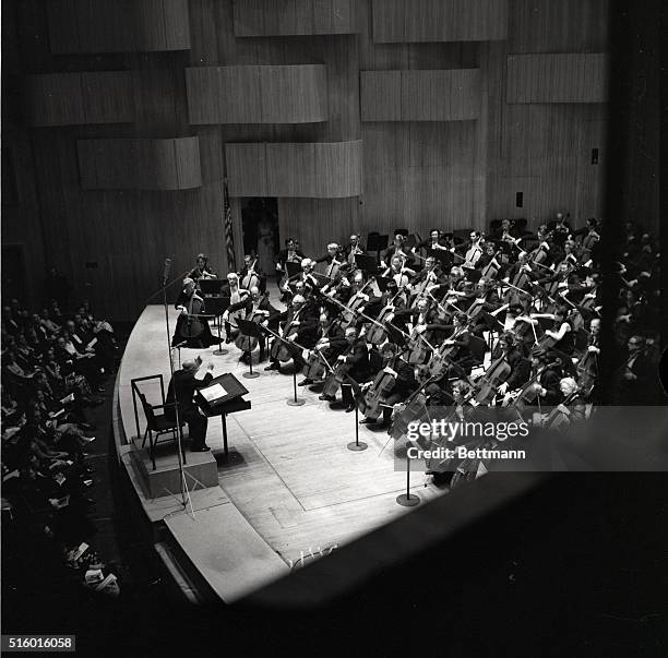 World-renowned cellist Pablo Casals conducts 100 cellists in one of his own compositions April 15 at a gala concert in honor of his "artistry and...