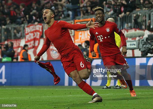 Thiago of Bayern Muenchen celebrates his goal together with his teammate Kingsley Coman during the Champions League round of 16 second leg match...