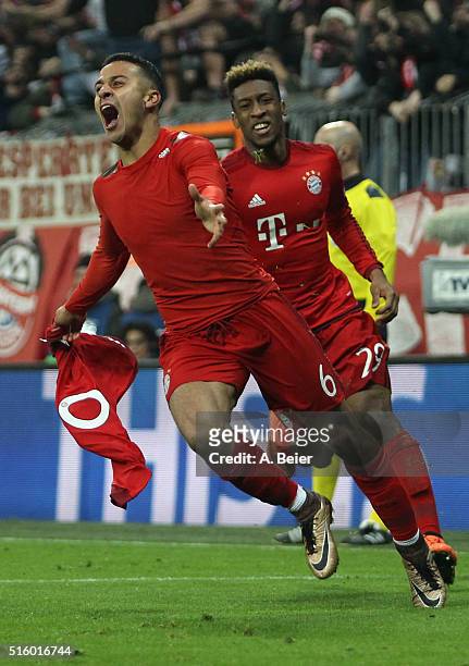 Thiago of Bayern Muenchen celebrates his goal together with his teammate Kingsley Coman during the Champions League round of 16 second leg match...