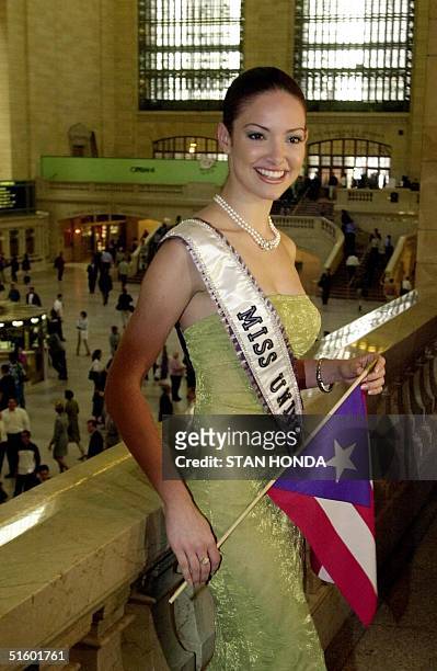 Miss Universe 2001, Denise M. Quinones of Puerto Rico, poses on the balcony in New York's Grand Central Terminal 15 May, 2001. The 20-year-old Miss...