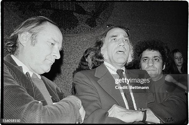 Chicago:With atty William Kunstler by his side, Abbie Hoffman talks to newsmen in the lobby of the Dirksen-Federal Building in Chicago Nov. 15. On...