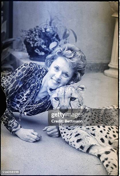 Actress Tippi Hedren, Vice-President of the Elsa Wild Animal Appeal, poses with "Kenya," a playful, fully grown cheetah. Together they hope to...