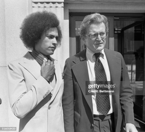 Black Panther leader Huey P. Newton and his new attorney Michael Kennedy hold an impromptu news conference on the steps of the Alameda County...