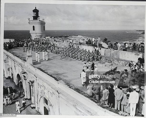San Juan, Puerto Rico: The Constitution Day ceremonies reach a climax as troops and guests are on hand at the fortress of El Morro to watch the...