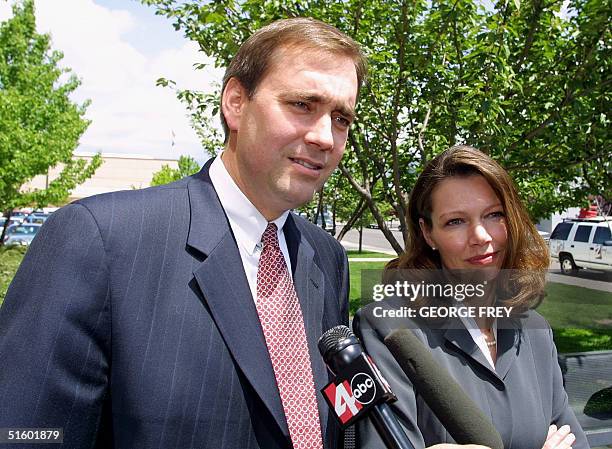 Juab county Prosecutor David Leavitt and Utah state investigator Dina Hollis talk with reporters outside 4th District Court 17 May 2001 in Provo,...