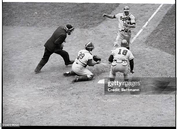 Brooklyn, New York: This daring dash homeward on an eighth inning attempted steal with the bases loaded by Brave left fielder Bobby Thomson ---cost...