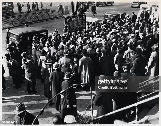 Harlem Blacks protesting against conviction of Haywood Patterson, one of the accused in Scotsboro Case involving rape of two white girls. Photograph,...