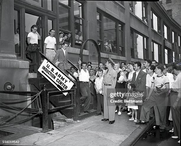 New York, NY: Group of men leaving Army Induction Center in New York City.