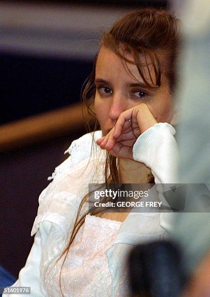 Shirley Green sits in the court room stunned after her husband, Utah polygamist Tom Green, was convicted of four counts of bigamy and one count of...