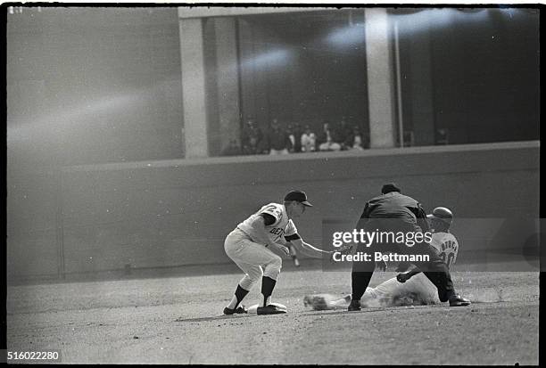 Busch Stadium: Lou Brock, Cards, is nailed at 2nd by Tiger SS Mickey Stanley in 6th inning here 10/10 after Brock broke for 2nd on attempted steal...