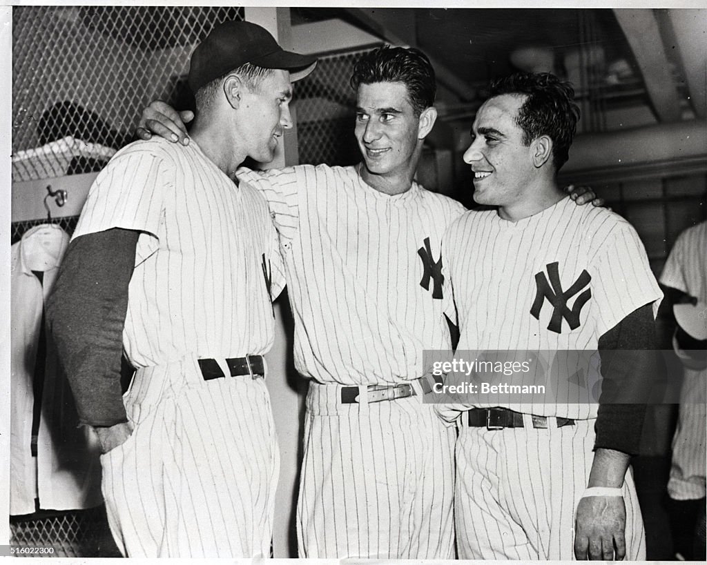 T Byrne Y Berra & B Brown After Victory