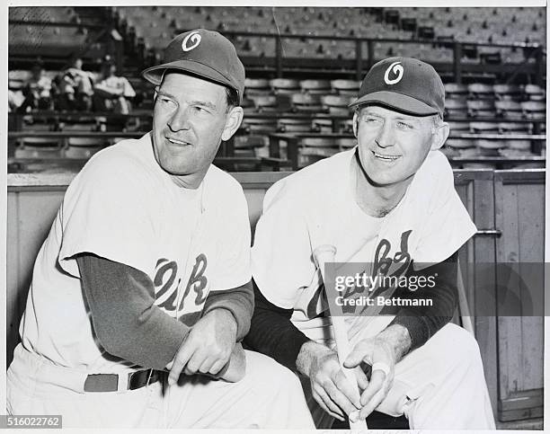 Oakland, CA- Sam Chapman , veteran Cleveland Indians outfielder, watches spring training with Mel Ott, manager of the Oakland Oaks. Chapman...