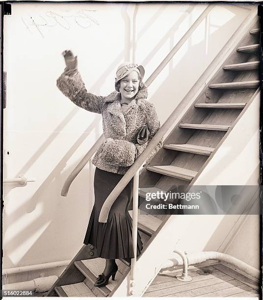 New York, NY- Miss Sonja Henie, Norse "Pavlowa of the Ice" and world champion figure skater, arrives on the Ile de France en route to Lake Placid,...