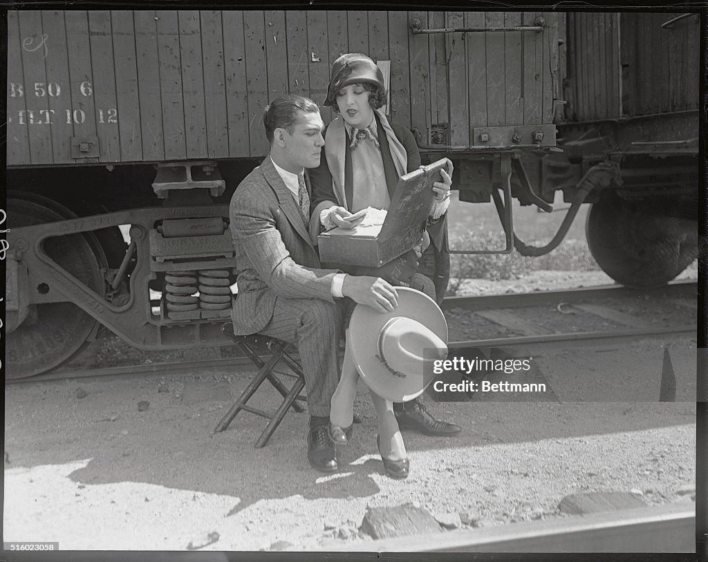 Jack Dempsey with Wife in his Lap