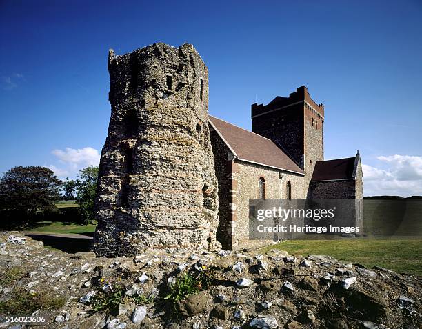 The Roman Pharos lighthouse and St Mary's Church, Dover Castle, Kent, 2005. The rough masonry tower at the west end of the church of St...