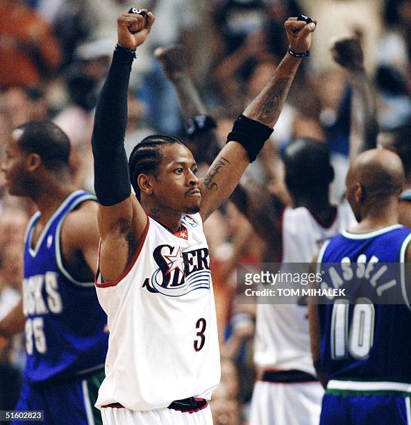 Allen Iverson of the Philadelphia 76ers celebrates after defeating the Milwukee Bucks in their NBA Eastern Conference finals 03 June 2001 at the...