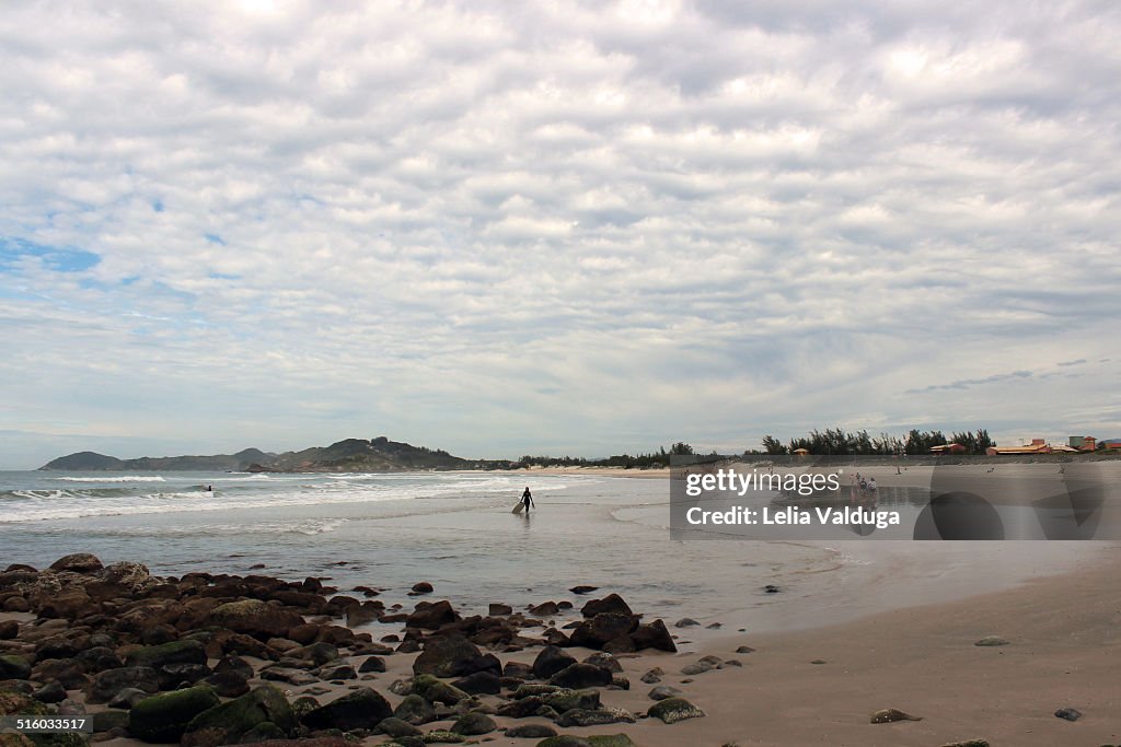 Surfer returning to the beach.