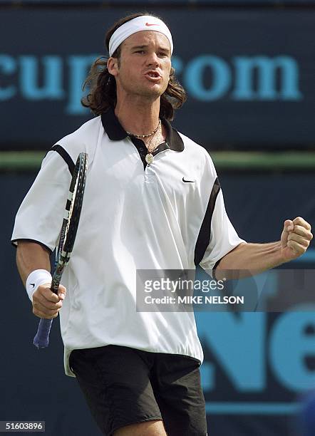 Carlos Moya of Spain reacts after winning a point during the Champions Cup final match against Mark Philippoussis of Australian 14 March 1999 in...