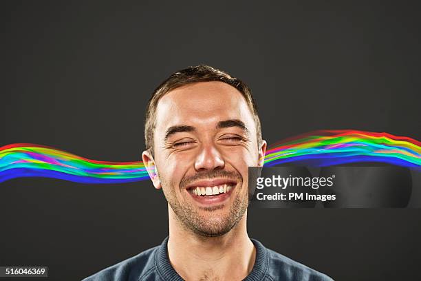 happy man hearing - spectrum 2014 inside stock-fotos und bilder