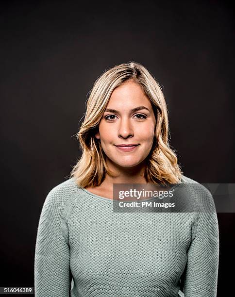 portrait of young woman - blonde hair black background stock pictures, royalty-free photos & images