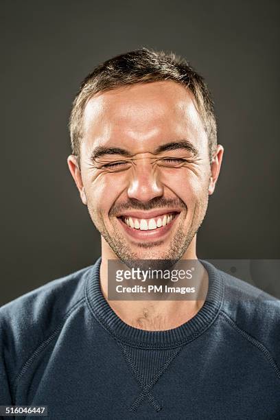 portrait of happy young man - cheesy grin stock pictures, royalty-free photos & images