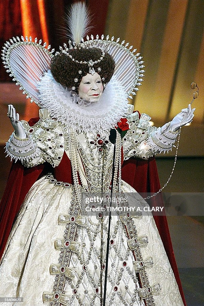 Oscar's Host Whoopi Goldberg, dressed as Queen Eli