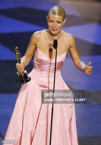 Gwyenth Paltrow holds her Oscar after winning for Best Performance by an Actress in a Leading Role for her part in the movie "Shakespeare in Love"...