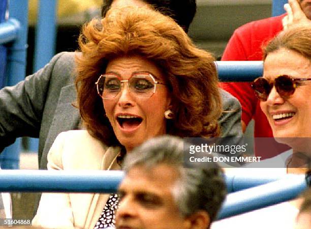 Italian actress Sophia Loren enjoys the stadium court match between Pete Sampras of the U.S. And Daniel Vacek of Czechoslovakia 02 September 1993 at...