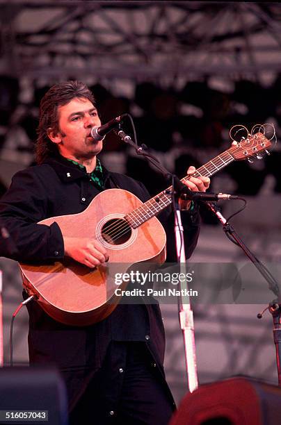 British musician Robyn Hitchcock performs onstage at Patriot Stadium during the Earth Day benefit concert, Foxboro, Massachussetts, April 25, 1992.