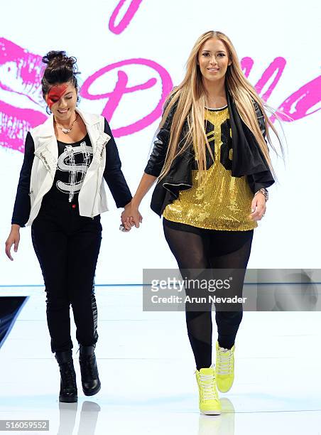 Designer Kaya Jones walks the runway with model wearing Hollywood Dolls at Art Hearts Fashion LAFW Fall/Winter 2016 at Taglyan Cultural Complex on...