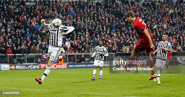 Thomas Mueller of Bayern Muenchen scores his team's second goal during the UEFA Champions League round of 16 second leg match between FC Bayern...