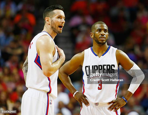 Redick and Chris Paul of the Los Angeles Clippers wait on the court during their game against the Houston Rockets at the Toyota Center on March 16,...