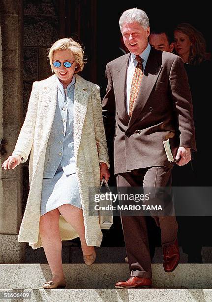 President Bill Clinton and First Lady Hillary Rodham Clinton depart Foundry Methodist Church following Sunday morning services 02 May, 1999 in...