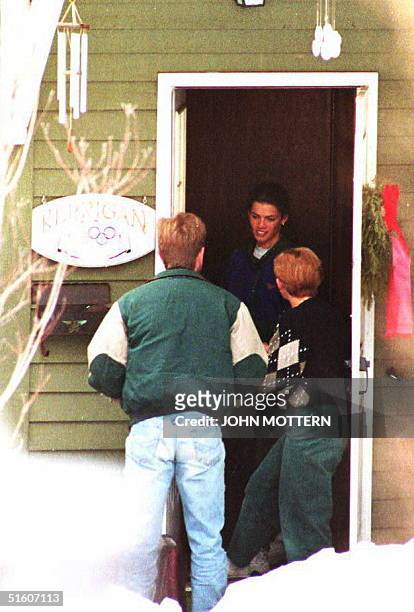 Figure skater Nancy Kerrigan and her mother, Brenda , in the doorway of her family home 12 January 1994 in Boston, MA. The Kerrigan family is...