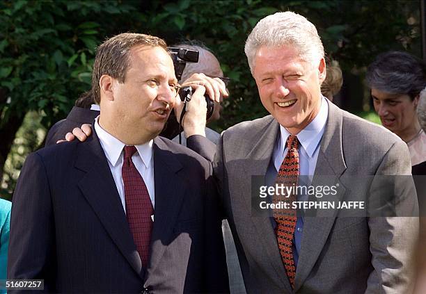 President Bill Clinton talks with Treasury Secretary nominee Lawrence Summers after a ceremony announcing the resignation of Treasury Secretary...