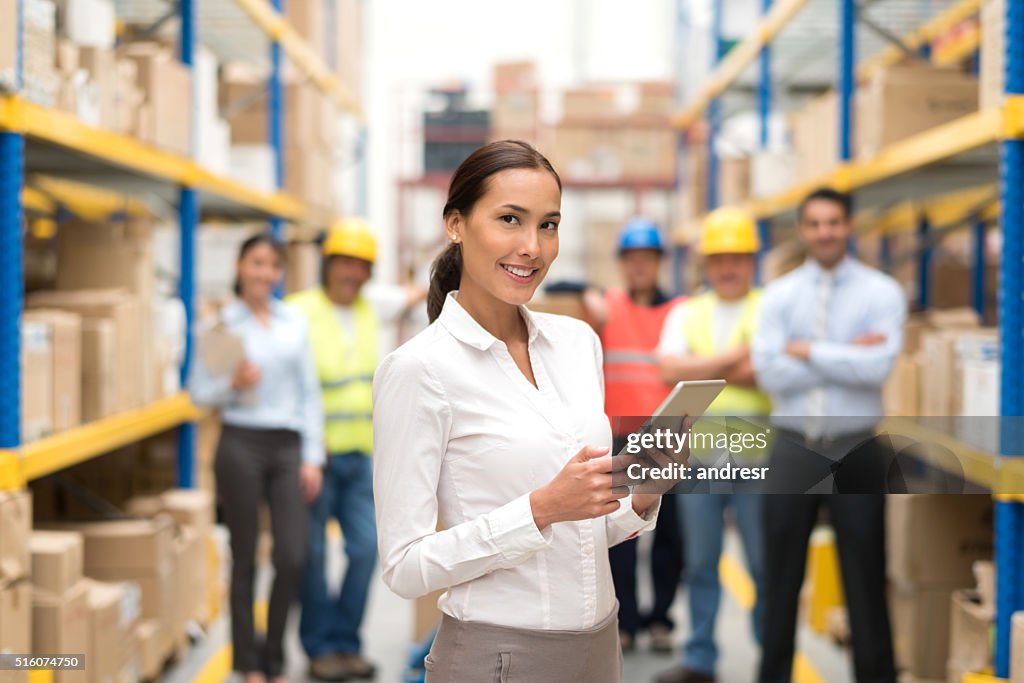 Business woman working at a warehouse