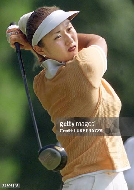 Amateur and Arizonia State University student Grace Park of Korea, watches her tee shot 03 June during the first round of the 1999 US Women's Open at...