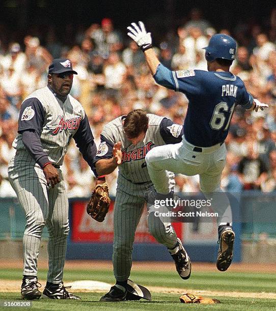 Los Angeles Dodgers pitcher Chan Ho Park kicks Anaheim Angels pitcher Tim Belcher during their brawl in the fifth inning of their 05 June 1999 game...